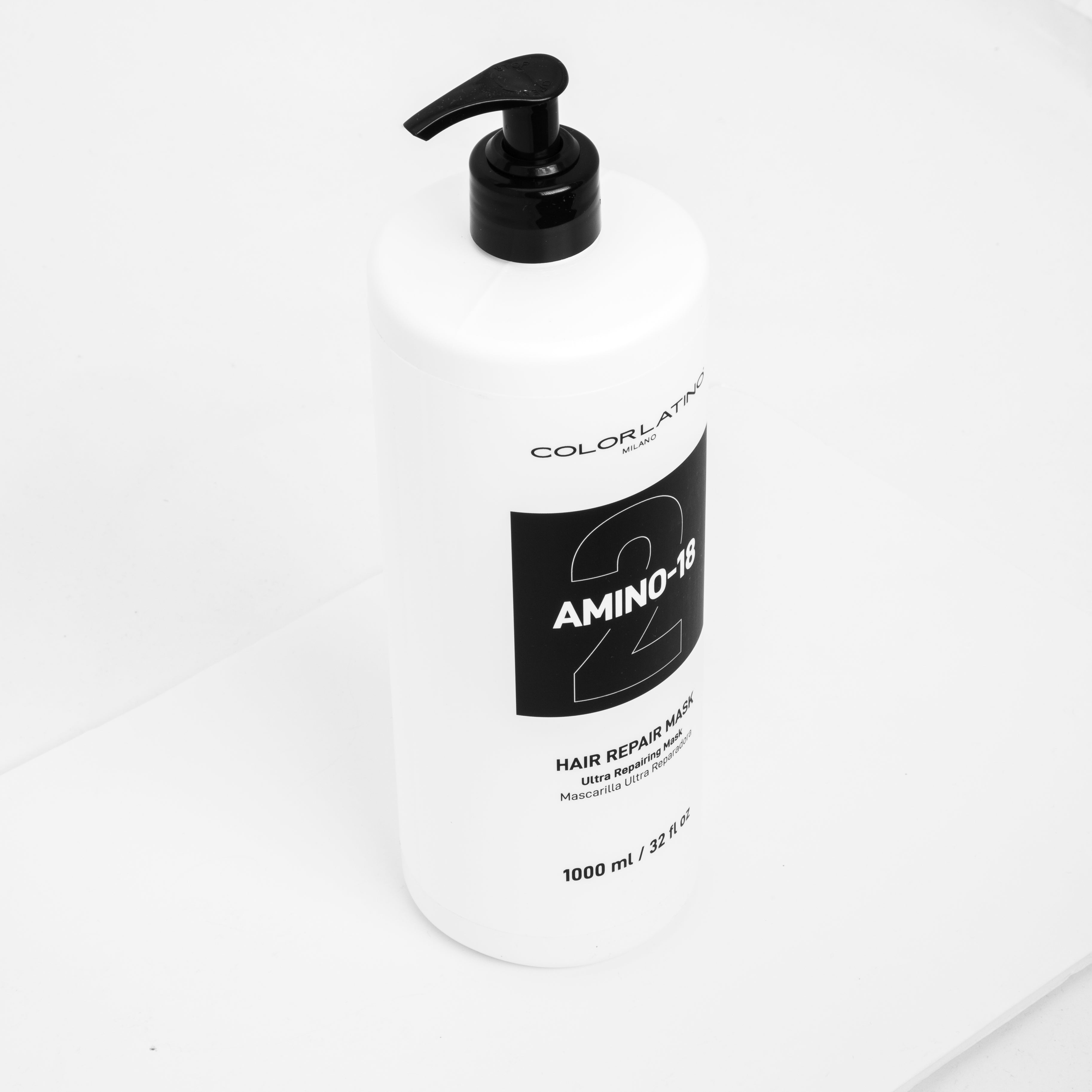 Hair care product bottle labeled 'Amino-18' on a white background