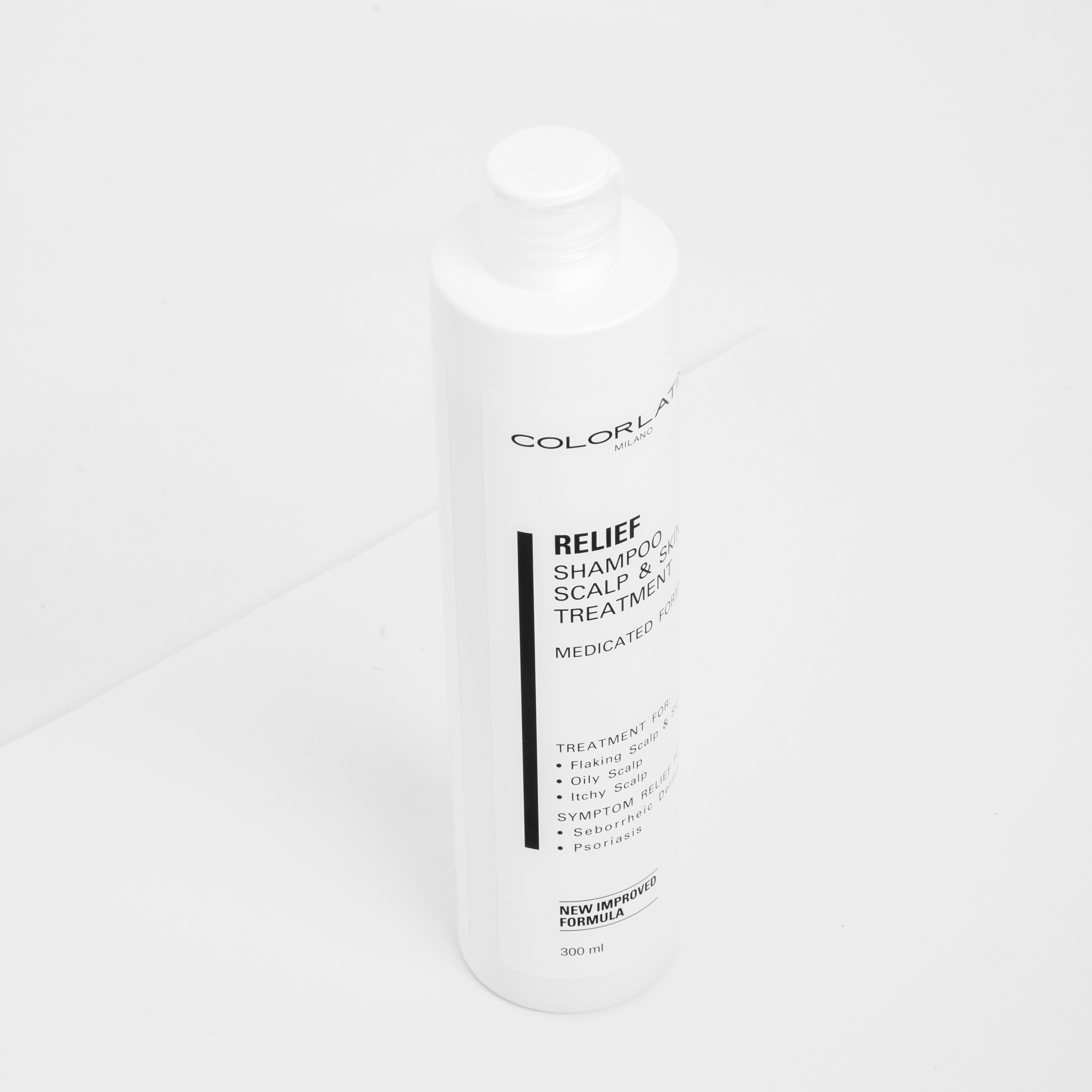 White bottle of Colorlab Relief Shampoo on a white background